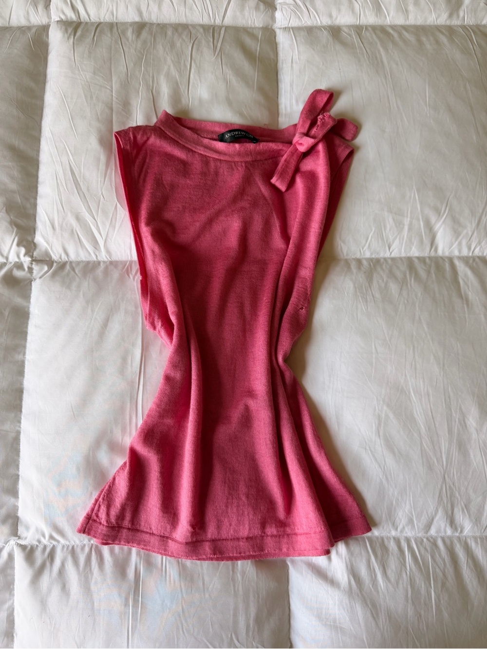 Sleeveless Pink Bow-Shoulder Cashmere Top. Small hole pictured